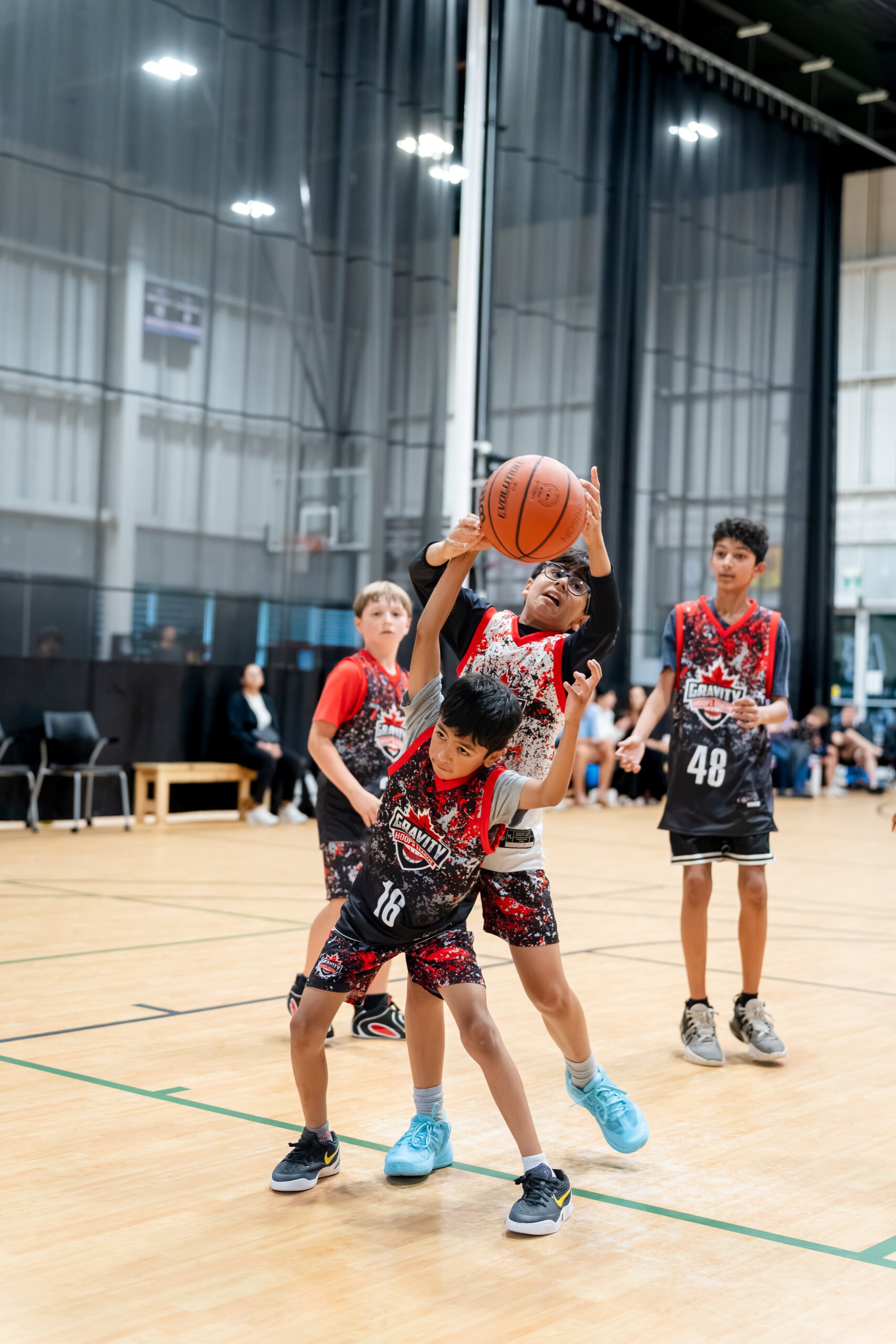 Gravity Select athletes in a Gravity Hoops League game